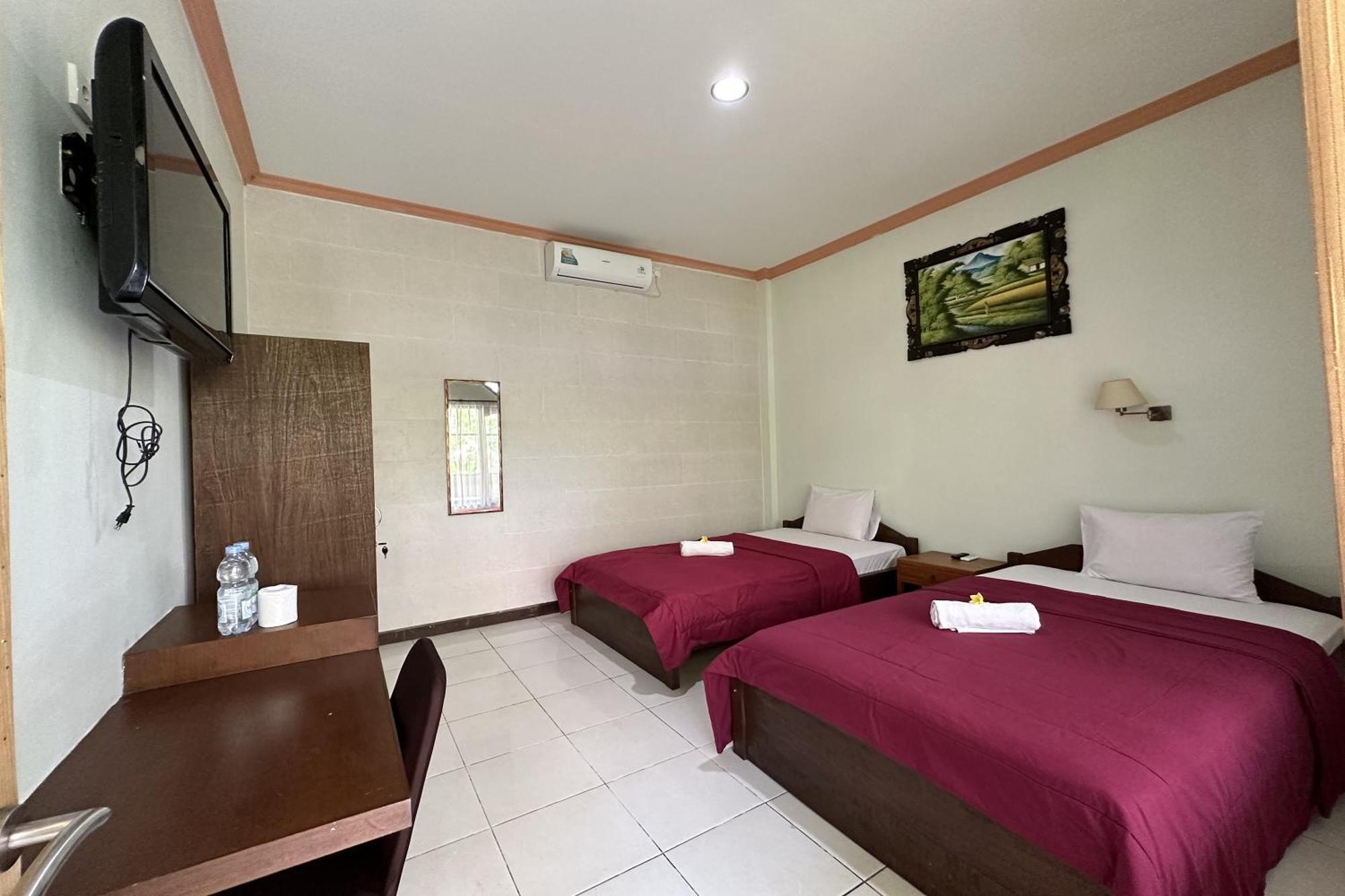 Taxa Raya Guest House Легиан Екстериор снимка