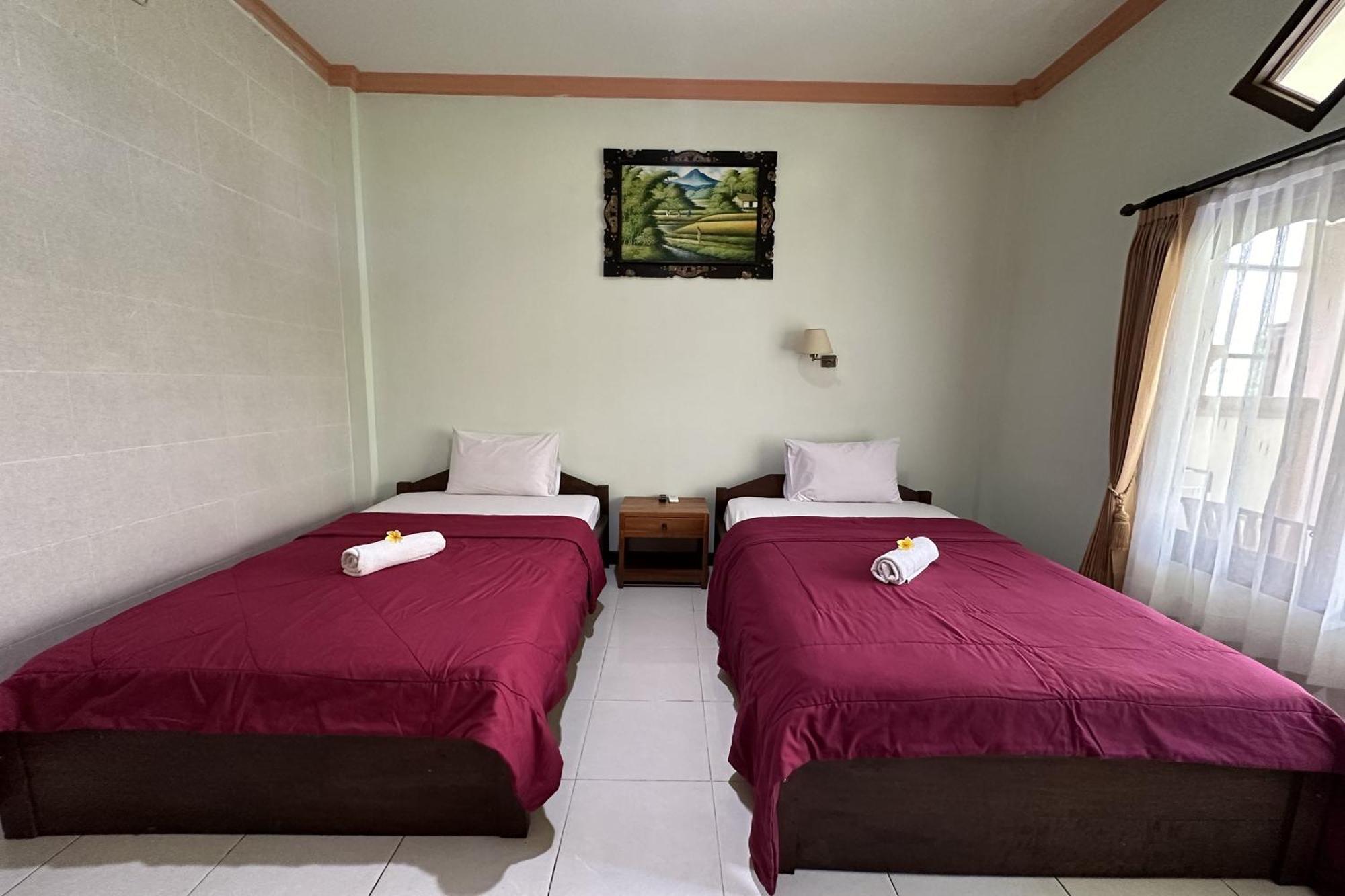 Taxa Raya Guest House Легиан Екстериор снимка